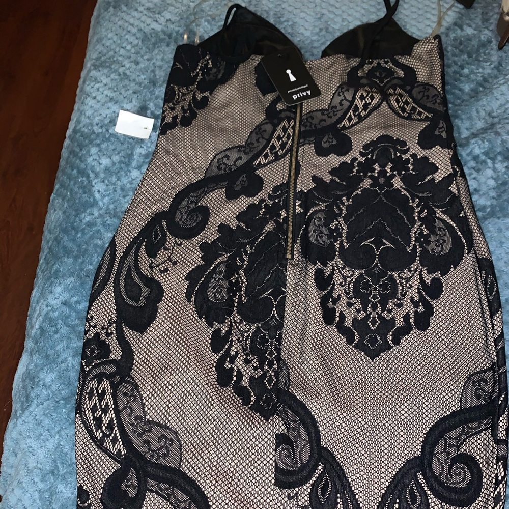 A beautiful mini dress never worn tag still on